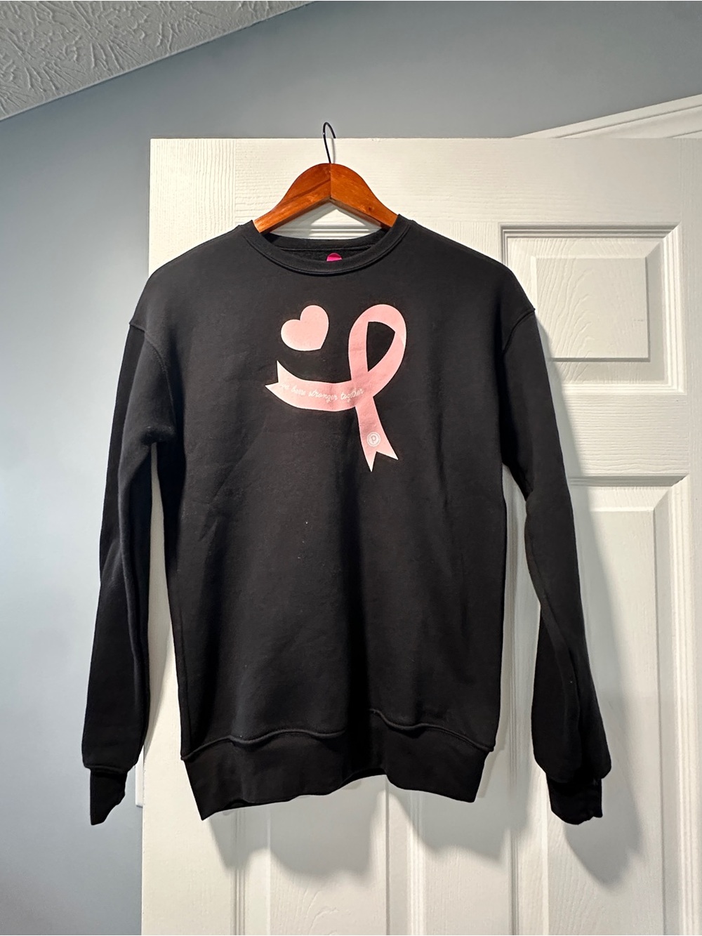 Black Sweatshirt with Pink Ribbon Graphic
